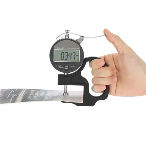 instrument to measure the thickness of a paper|tool used to measure thickness.